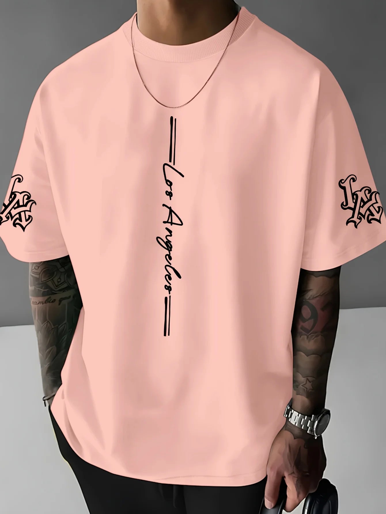 The 2025 summer new men's T-shirt is a casual fashionable and creative line letter print round-neck T-shirt with polyester men